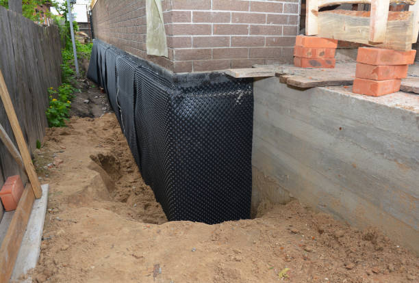 SJ Waterproofing Pros technician performing targeted Foundation Crack Repair assessment in La Vergne, TN